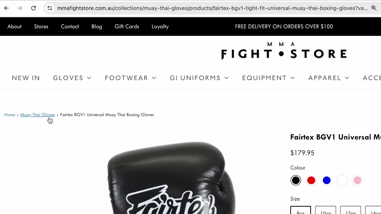A Shopify product page for boxing gloves with a collection-aware URL and a breadcrumb reading Home, Muay Thai Gloves, product name